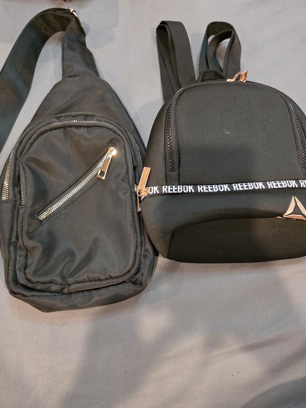 Reebok Black Crossbody Sling and Mini Backpack Set with Rose Gold Accents
